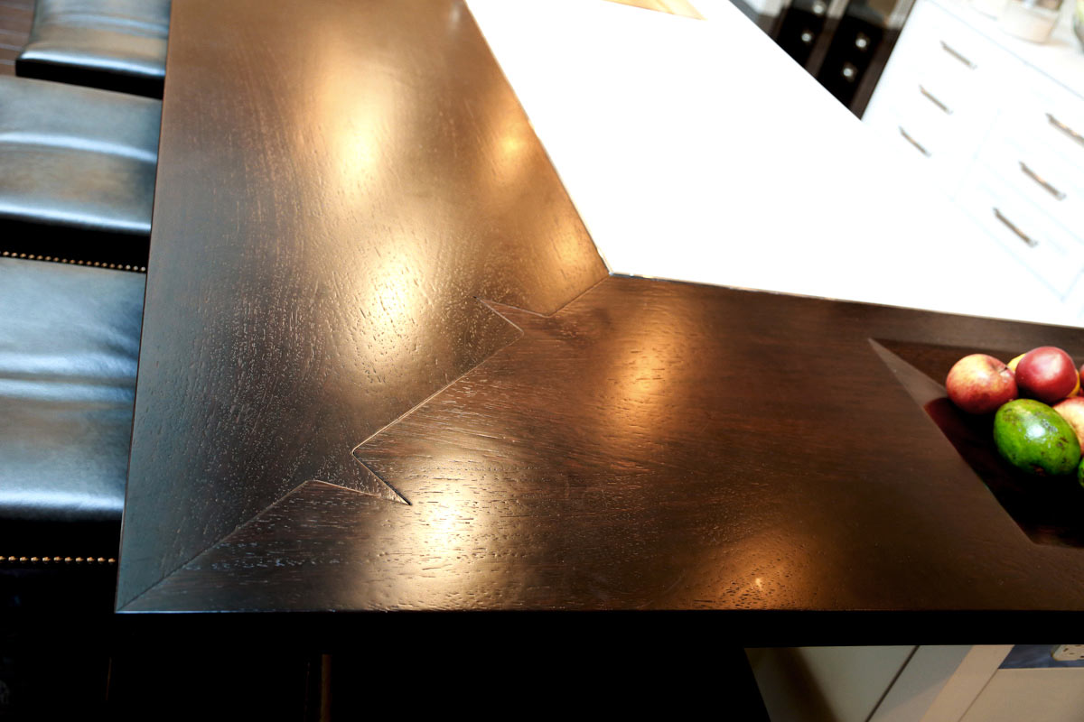 Wood countertop with shark tooth mitered corner