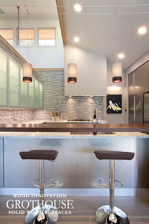 Peruvian Walnut Wood Bar Top Savannah, Georgia Peruvian Walnut Wood Bar Top in a contemporary kitchen design for a home in Savannah, Georgia